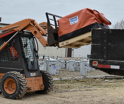 This patented product is designed with an integrated pallet bonded to a flexible, liquid-tight containment system for safe lifting, moving and storing.