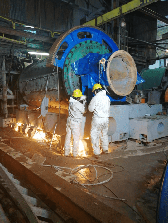 A picture containing factory
Description automatically generated