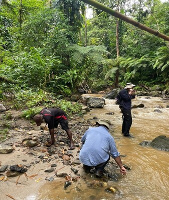 Figure 6.  Field reconnaissance underway on Feni Island project. (CNW Group/Adyton Resources Corporation)