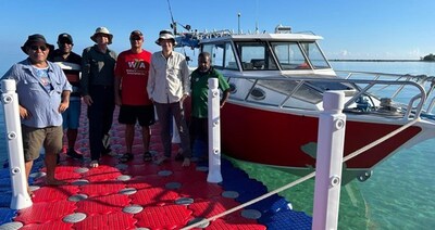 Figure 1. Adyton team ready to depart from New Ireland to go to Feni Island.  Team from L to R: Skarty Furuga (Senior Geologist), Chris Wamugl (Senior Geologist), Tim Crossley (CEO), The Hon. Walter Schnaubelt (Namatanai MP and Minister for Aviation), Dr Chris Bowden (COO), support crew. (CNW Group/Adyton Resources Corporation)