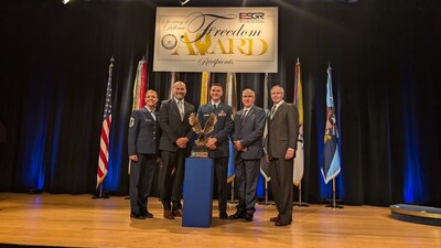 Earl Collins, Alec Londino and Eric Toth with Freedom Award presenters