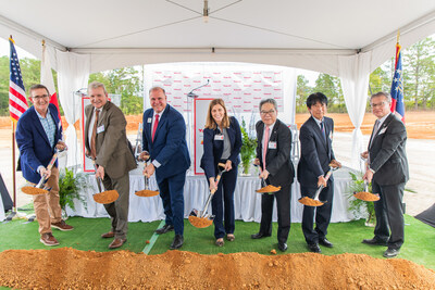 Stephen Gray, President & CEO, Gray, Inc. (left) with local officials and members of the Yakult team