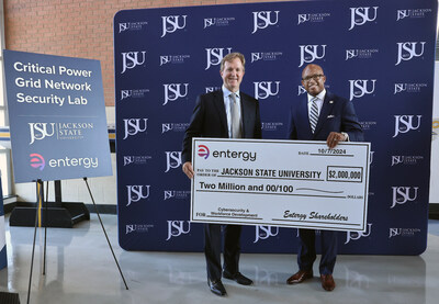 Entergy Mississippi President and CEO Haley Fisackerly and JSU President Marcus Thompson, Ph.D., are all smiles about JSU's new Critical Power Grid Network Security Lab funded by Entergy Charitable Foundation.