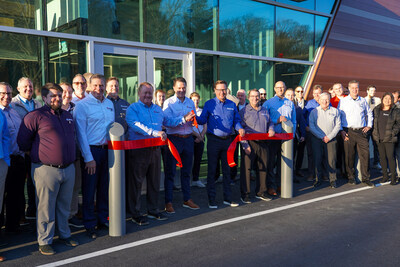 Evolution's executive team cuts red ribbon at the Wilmington facility grand opening.