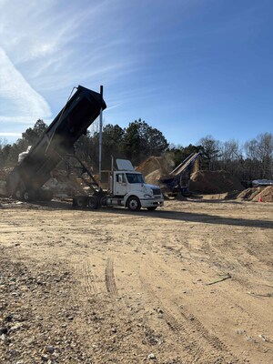 At our South Carolina facility, a customer is unloading used pallets for recycling. The wood from these pallets will be processed into Alternative Engineered Fuel, showcasing how innovative solutions reduce waste and drive environmental progress.