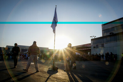 SDG&E employees observe the newly awarded Cal/OSHA VPP flag following a recognition ceremony at SDG&E’s Kearny Mesa facility on January 28.