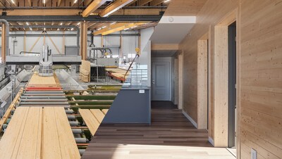 Photo montage of a factory manufacturing wood and decorative wood wall in a kitchen. (CNW Group/Natural Resources Canada)
