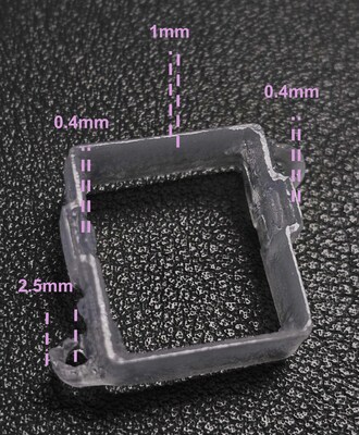 A panel retention bracket for electronics connector applications, made using Parallax Volumetric Additive Manufacturing from Manifest Technologies