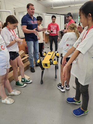 Instructors demonstrate robotics at Miami University in Oxford, Ohio.