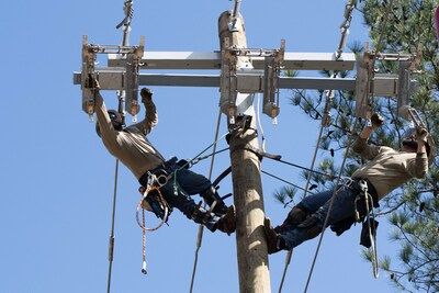 Georgia Power lineworkers work to restore power in Augusta after Hurricane Helene barreled through the state in September 2024.