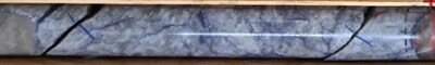 Figure 2: Pollucite in grey quartz matrix from 139.3 m to 139.5 m in drill hole CV24-520 (Vega Zone), within a wider zone of cesium mineralization grading 7.39% Cs2O over 7.1 m. (CNW Group/Patriot Battery Metals Inc.)