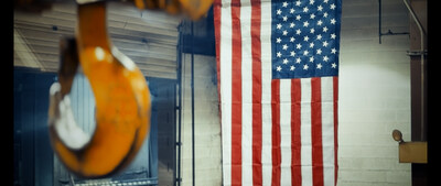 The American flag hung proudly in the shop at the manufacturing headquarters at ACECO