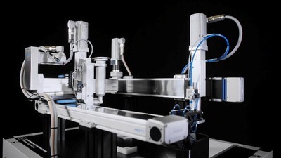 Electric light assembly demo at the Festo booth features a Cartesian handling system, left, for gluing and a pick-and-place handling system, right. The ELGD axes are the centerpieces of this demo.