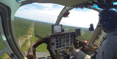 LiDAR data is gathered along FirstEnergy transmission rights-of-way by a helicopter with equipment provided by GeoDigital International, Inc.