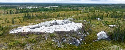 Figure 31: Principal spodumene pegmatite dyke outcropping at CV5 (looking southerly). (CNW Group/Patriot Battery Metals Inc.)