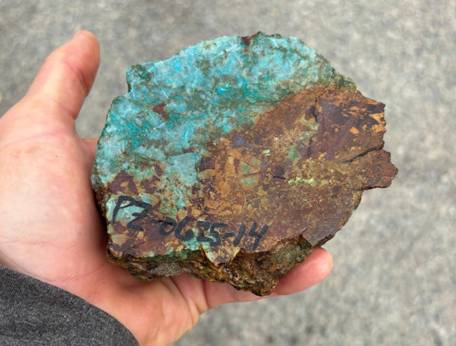 A person holding a piece of rock AI-generated content may be incorrect.