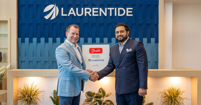 Mr. Steve Dustin (on the left), President & CEO of Laurentide Controls, shakes hands with Mr. Ammar Rashid (on the right), Country Head of Danfoss Drives Canada, during the official handover of the plaque confirming Laurentide’s appointment as an authorized distributor of Danfoss Drives. (CNW Group/Laurentide Controls)