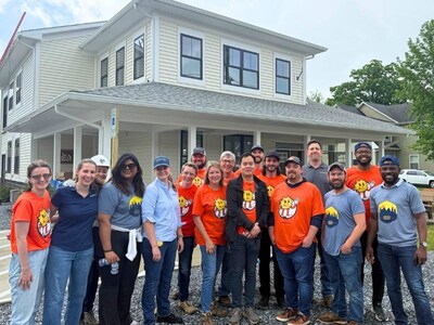 Members of the Chaberton Energy team volunteer at the Ladies of Charity, Calvert County’s food pantry in North Beach, Maryland.