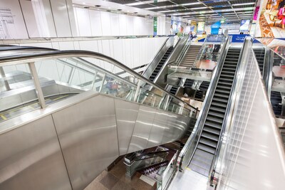 Otis escalators at City Hall MRT Station.