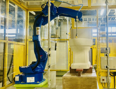 At TOTO’s new Morrow, GA, manufacturing facility, dust-removal robots spray compressed air to clear dust and debris, enhancing workplace cleanliness and ensuring consistent product quality. They also remove excess glaze from toilet tanks and rims, which allows for flawless kiln firing and the precise finishing needed to produce TOTO’s luxury one-piece toilets.