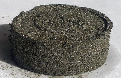 Figure 1 – Samples of Awaruite Concentrate Produced from Baptiste’s Production Run Pilot Plant (CNW Group/FPX Nickel Corp.)