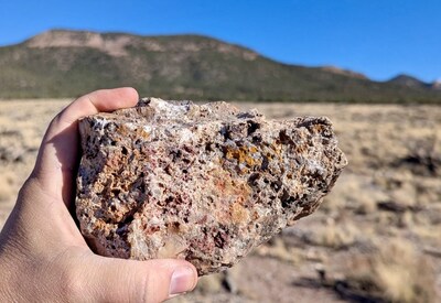 Figure 2. Hematitic epithermal quartz vein with 20.8g/t gold at the Western Rim Target, in an area recently ripped up and cleared by BLM. The treeline in the background demonstrates the new area opened up by the BLM for exploration, with subcropping quartz veins now traced along a new 1.5km trend. (CNW Group/Nevada King Gold Corp.)