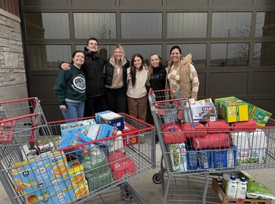 Everlight Solar's staff members donate to local food pantry