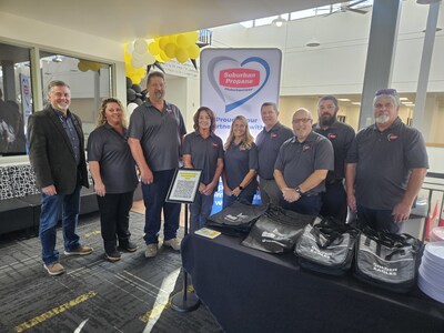 Suburban Propane volunteers pose with Twin Falls County Commissioner Don Hall at Gilbert's Pantry in Twin Falls, Idaho. Suburban Propane volunteers pose with Twin Falls County Commissioner Don Hall at Gilbert's Pantry in Twin Falls, Idaho.