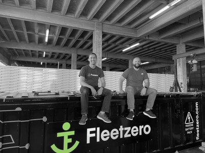 Steven Henderson, co-founder and CEO, and Mike Carter, co-founder and COO, with the Fleetzero Containerized Leviathan™ Battery System.