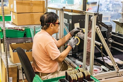 A Garrett employee in their Garland, Texas manufacturing facility.