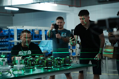 Huepar uses Automated Precision Verification to ensure sub-millimeter consistency. Global partners are pictured here witnessing the rigorous stability testing that underpins the brand's 5-year warranty.