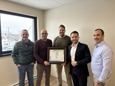 DIPRA Regional Director, Canada, Sam Ghosn (second from right) presents a certificate inducting the City of Alma, Quebec (Canada) into DIPRA's Century Club, honoring the resilience of cast iron water infrastructure. Also pictured, from the left are, Styve Gagnon, sales representative of BCM products, a distributor of Canada Pipe in Saguenay region of Quebec; Marc André Lachance, engineer and technical coordinator for the city of Alma; Frédéric Tremblay, Public Works coordinator.; To the right of Ghosn is Maxime St-Onge, sales representative for Québec East for McWane Canada.