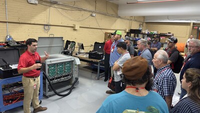 Vice President of Product Strategy, Perry Lawton demonstrates TESCO's EVSE charging testing equipment for TESCOOL's 2025 student class