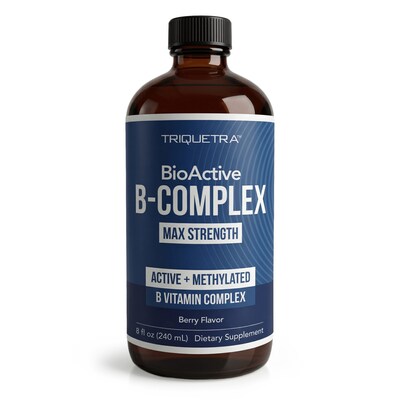 This image shows a Triquetra BioActive B-Complex liquid supplement in a large amber glass bottle with a black cap. The label features a blue gradient design with bold white text highlighting “B-Complex,” “Max Strength,” and “Active + Methylated B Vitamin Complex.” It also notes berry flavor and an 8 fl oz (240 mL) size, emphasizing a clean, high-potency, clinically styled wellness product.