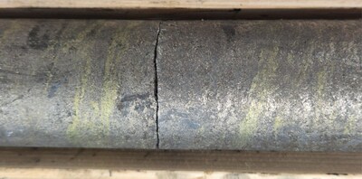 Photo 1:  Massive pyrrhotite with about 10% chalcopyrite in regular bands at 85 degrees core angle .  Center of photo was taken at 243.75m in hole CUP26-06 (CNW Group/Cupani Metals Corp.)