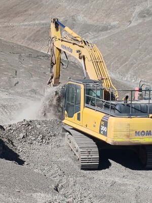 Figure 1. Komatsu PC300LC excavator constructing drill pads at the Cordillera Cobre Project, El Alto Target. (CNW Group/Super Copper Corp.)