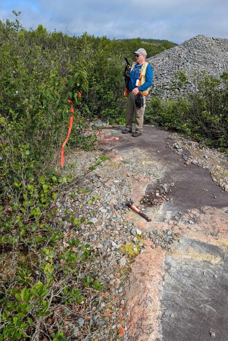 Figure 4- AIS team locating drill holes